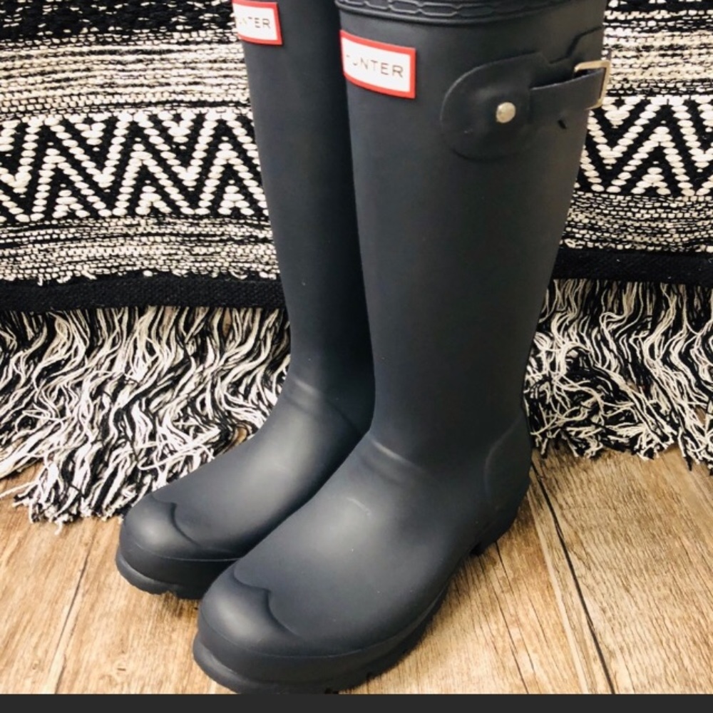 Hunter rain boots.
